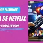 Una persona con un control remoto averigua cómo eliminar la cuenta de Netflix.