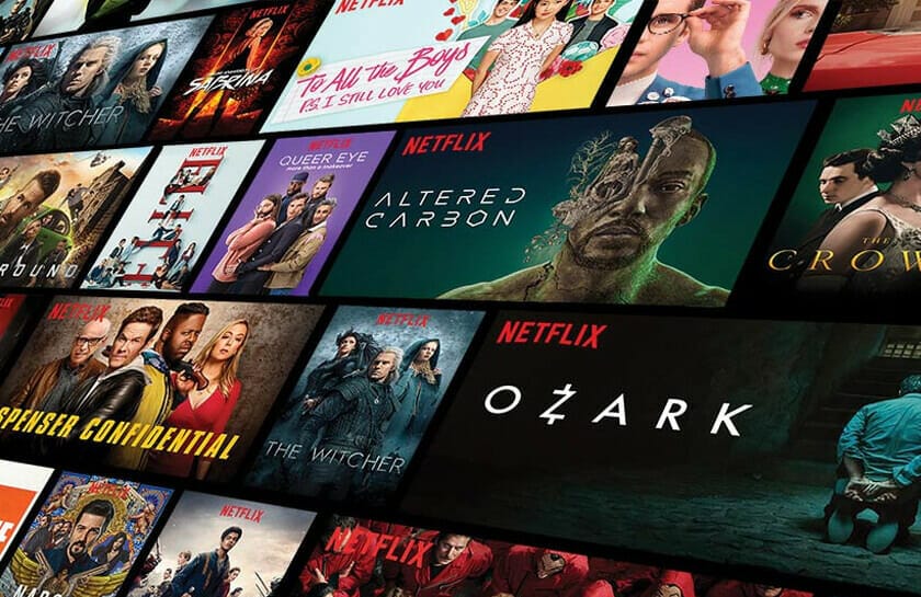 Cómo borrar el historial de Netflix - Los programas de televisión de Netflix se muestran en una pared.